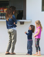 A Stressed Looking Brooke Burke Deals With Whiny Children