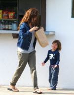 A Stressed Looking Brooke Burke Deals With Whiny Children