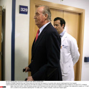  MADRID: Spanish King Juan Carlos leaves his room with the support of crutches after doctors discharged him from hospital