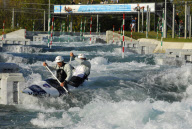 canoeists practice at Lee Valley White Water Centre, the London 2012 Canoe Slalom venue.
