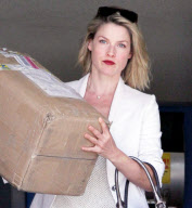 EXCLUSIVE Ali Larter picks up a package