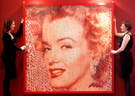 Artist David Mach bikini-clad woman picture made from Queen postcards and Marilyn Monroe postcard picture to be sold, Scotland - 20 Apr 2012