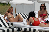 Michelle Hunziker Hangs On The Beach