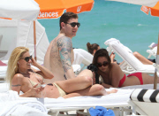 Michelle Hunziker Hangs On The Beach