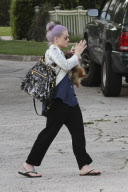 *EXCLUSIVE* Kelly Osbourne and her rescued pup visit baby Pearl