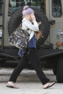 *EXCLUSIVE* Kelly Osbourne and her rescued pup visit baby Pearl