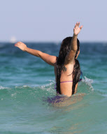 Singer Tulisa Contostavlos in Miami Beach enjoy the sun and the ocean.