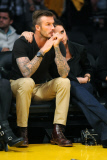 David and Victoria Beckham watch the Lakers courtside