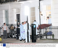 The Body Of A Man Found Dead In Pimlico Is Removed From The House In Alderney Street Pimlico London Sw1 As Police And Forensic Officers Look On. He Was Later Identified As Gareth Williams Who Worked For Mi6 Picture By: Nigel Howard Email: Nigelhoward