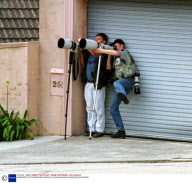 PAPARAZZI PHOTOGRAPHERS WATCH JULIAN MACMAHON AND BROOKE BURNS