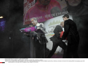 FRA: Francois Hollande receives flour, thrown by a woman flavour, thrown by a woman