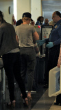 Scarlett Johansson Hides at LAX