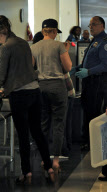 Scarlett Johansson Hides at LAX