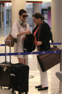 Anne Hathaway jets out of Miami