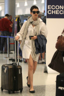 Anne Hathaway jets out of Miami