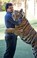 Michael Jamison at home with his pet tiger Enzo, Brakpan, South Africa - 03 May 2012