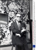 Karl Lagerfeld - Fashion Designer 14th September 1987 Chanel Dress Designer Karl Lagerfeld With Some Of His Creations Exhibited At Sotheby's. Also Portraits In Front Of A Montage....fashion Designer