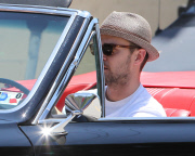 Justin Timberlake driving his vintage GTO with a mystery brunette