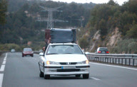 Driver Transporting an Unattached Wheelie Bin on Top of His Car, Cannes, France - 20 May 2012