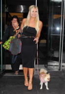 Brooke Hogan leaving her hotel with her dog