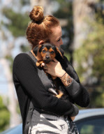 Miley Cyrus loving up her pup!