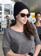 Kristen Stewart at JFK in dark colors