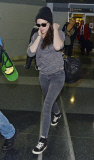 Kristen Stewart at JFK in dark colors