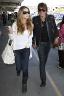 Denise Richards and Richie Sambora look happy at LAX