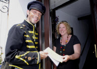 Man starts own Penny Farthing bicycle postal service in Bude, Cornwall, Britain - May 2012