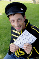 Man starts own Penny Farthing bicycle postal service in Bude, Cornwall, Britain - May 2012