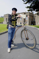 Man starts own Penny Farthing bicycle postal service in Bude, Cornwall, Britain - May 2012