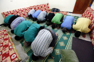 Medical staff prays in field hospital