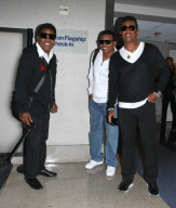 Tito, Jackie And Jermaine Jackson Arriving For A Flight At LAX