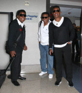 Tito, Jackie And Jermaine Jackson Arriving For A Flight At LAX