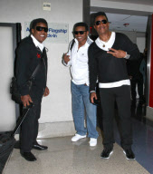 Tito, Jackie And Jermaine Jackson Arriving For A Flight At LAX