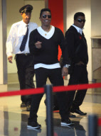 Tito, Jackie And Jermaine Jackson Arriving For A Flight At LAX