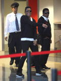 Tito, Jackie And Jermaine Jackson Arriving For A Flight At LAX