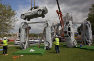 Scrap car Stonehenge replica unveiled for summer solstice at Potter's Field, London, Britain - 20 Jun 2012