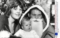 John Brown Plays Santa As His Daughter Louise Brown Celebrates Her First Christmas. Louise Was The Worlds First Test Tube Baby And They Are Also With Mother Lesley.