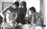 Mother Lesley Brown And Stepsister Sharon Brown Watch Louise Brown The Worlds First Test Tube Baby Have Her Nappy Changed