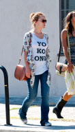 A Very Happy Olivia Wilde Navigates With Her iPhone in Venice