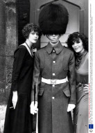 Joan Collins - Actress - 1981 - Eyes Front - Actress Sylvia Kristel And Joan Collins - Two Of The Sexiest Ladies In The World With A Young Man Outside St James Palace Who Couldn't Do Anything About It... Picture Desk ** Pkt5204-357558