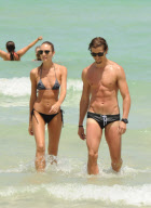 Bikini babe Candice Swanepoel is a beach goddess with boyfriend in Miami Beach