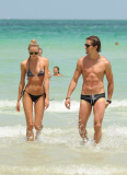 Bikini babe Candice Swanepoel is a beach goddess with boyfriend in Miami Beach