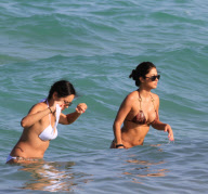 Playboy model Arianny Celeste pours fierce curves into snakeskin bikini 