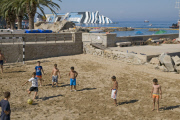 Bathers on beach of Scalettino near the wreck of Costa Concordia, Isola Del Giglio, Italy - 07 Jul 2012
