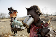 Refugees gather in Rum, Upper Nile State, on the border, Sudan - Jun 2012