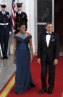 Pres. Obama and first lady welcome British PM Cameron and wife Samantha for State Dinner in Washington