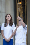 Olympic Torch Relay passes through Buckingham Palace, London, Britain - 26 Jul 2012