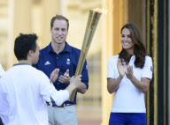 Olympic Torch Relay passes through Buckingham Palace, London, Britain - 26 Jul 2012